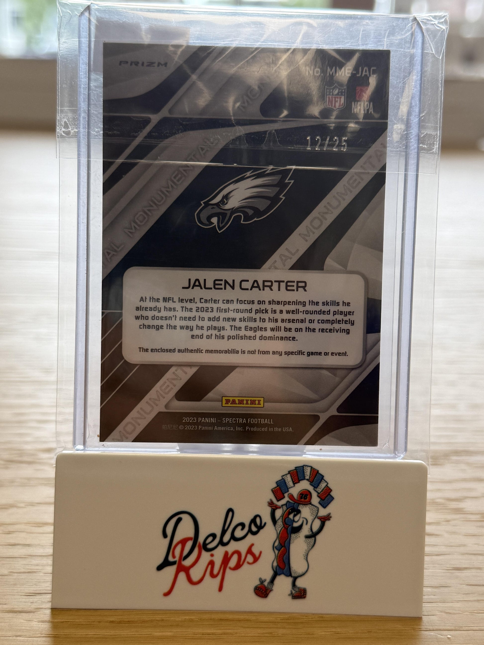 2023 Panini Spectra #MME-JAC Jalen Carter Monumental Memorabilia Meta #/25