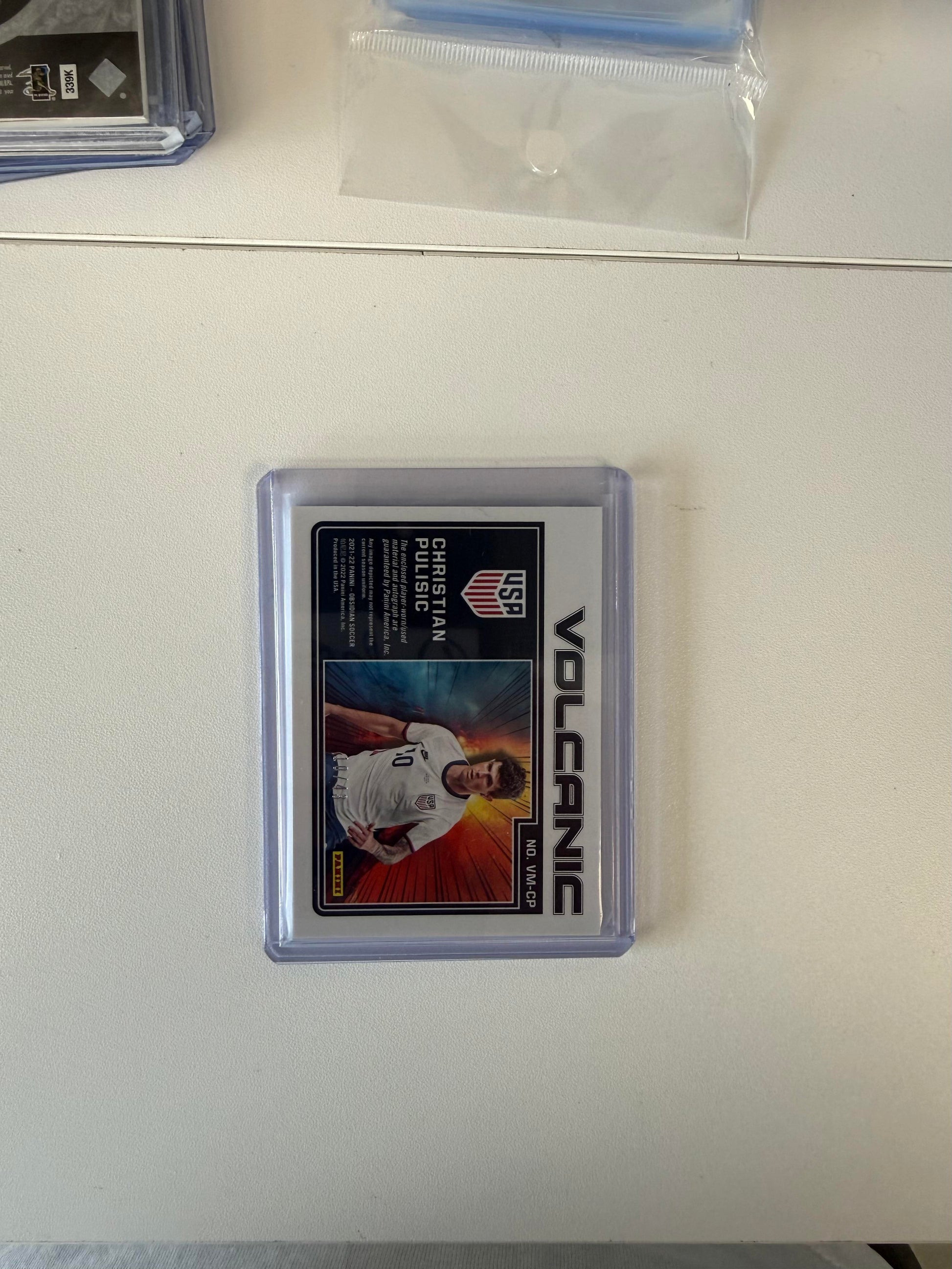 2021-22 Panini Obsidian #VM-CP Christian Pulisic Volcanic Material Auto  #/43