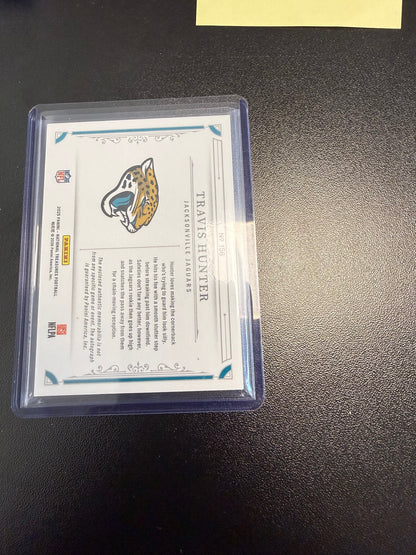 2025 Panini National Treasures #156 Travis Hunter Purple #/49