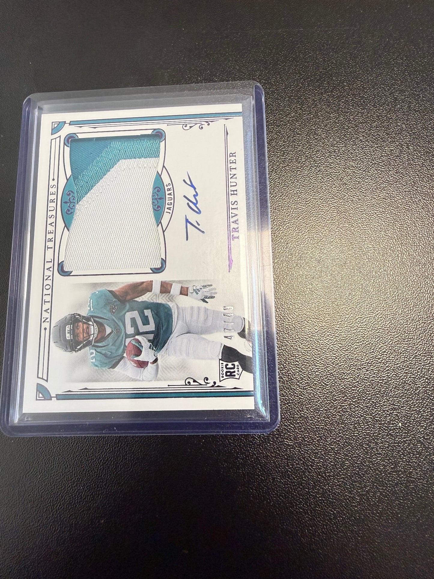 2025 Panini National Treasures #156 Travis Hunter Purple #/49