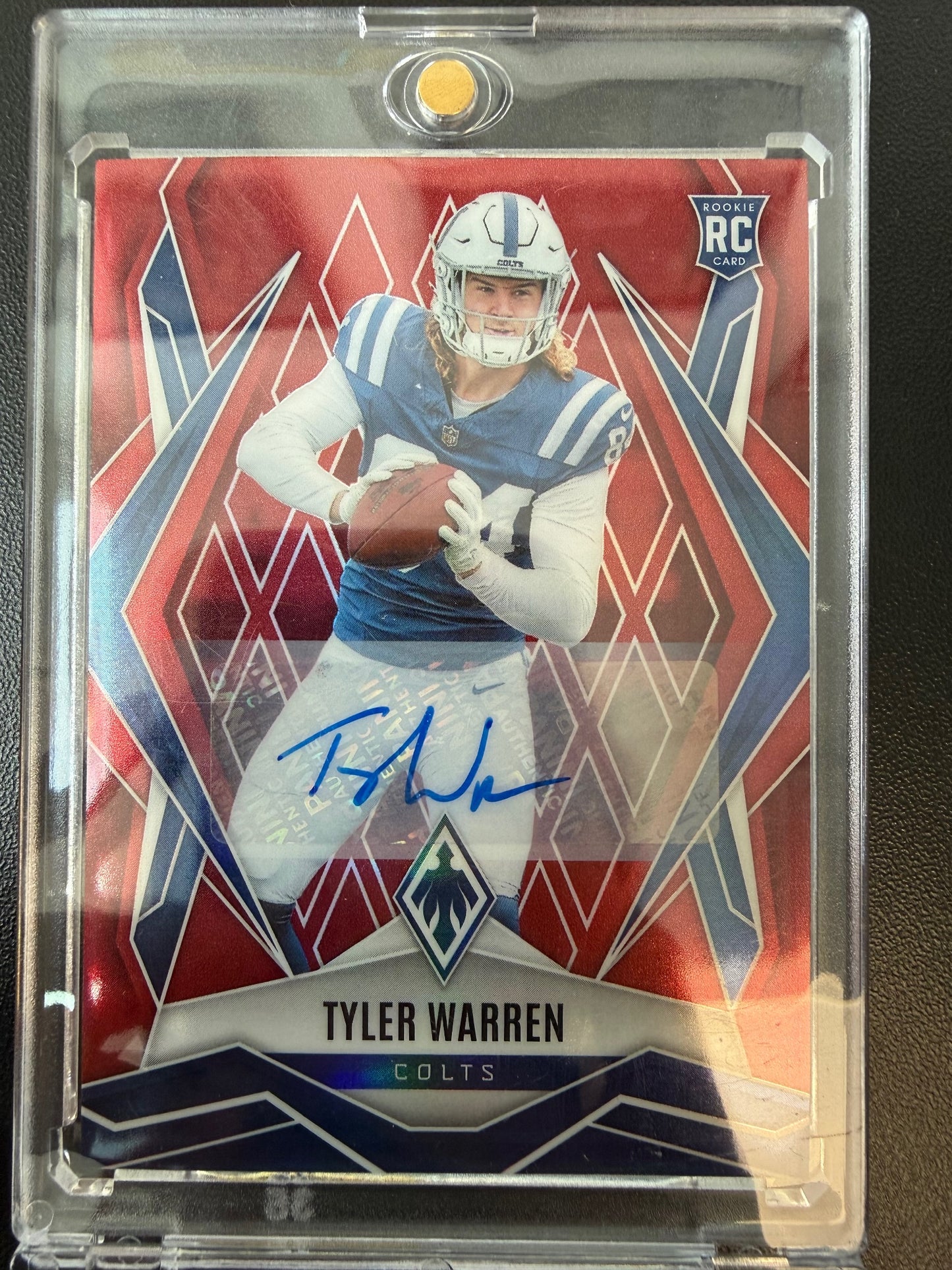2025 Panini Phoenix #185 Tyler Warren Red Prizm #/99