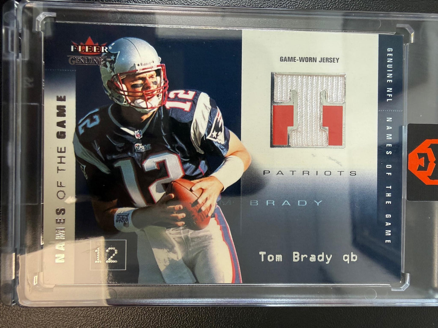 2002 Fleer Genuine #TB-NG Tom Brady Names of the Game Jerseys #/500